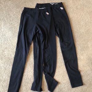 Two pairs of black Abercrombie kids leggings